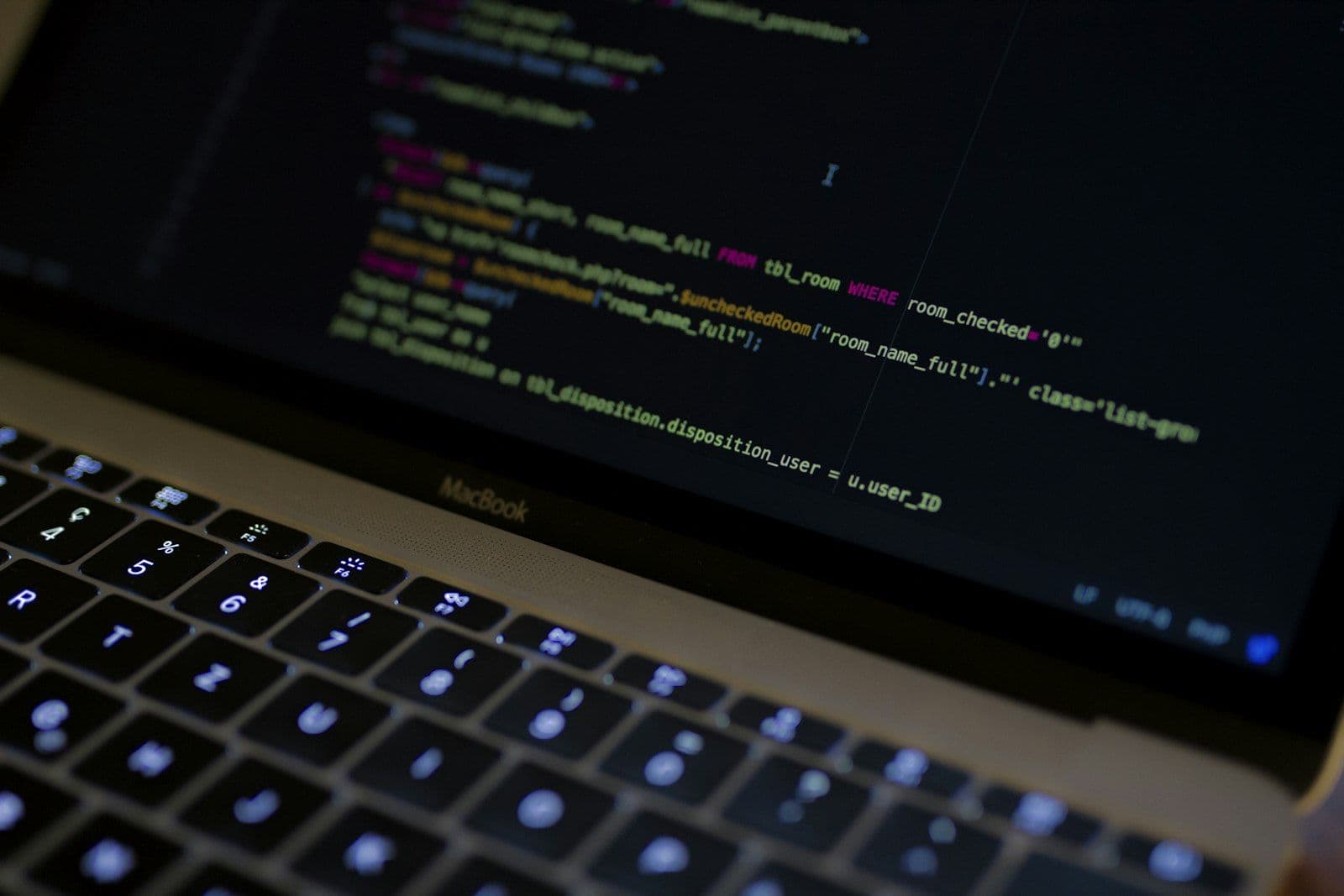 A laptop with a code editor open